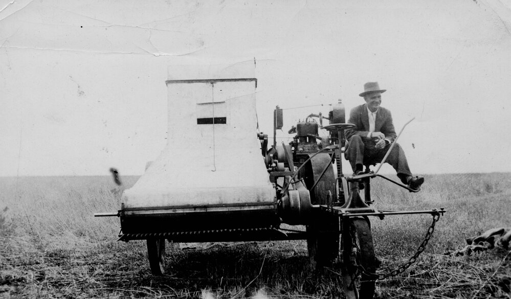 Mr. B. Zerbst on a harvester, Chinchilla, 1915