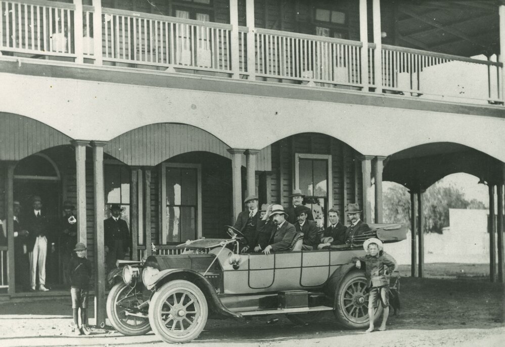 Group of people in front of the Windsor Hotel, Miles, circa 1929
