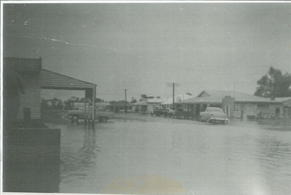Sara Street in flood, Meandarra, 1956