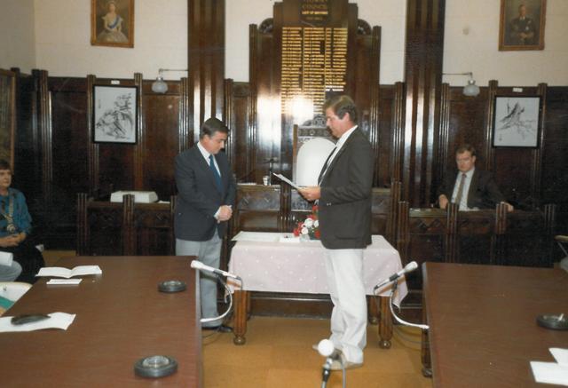 Alderman Bruce Christie reciting the Oath of Office, Dalby Town Council, 1985