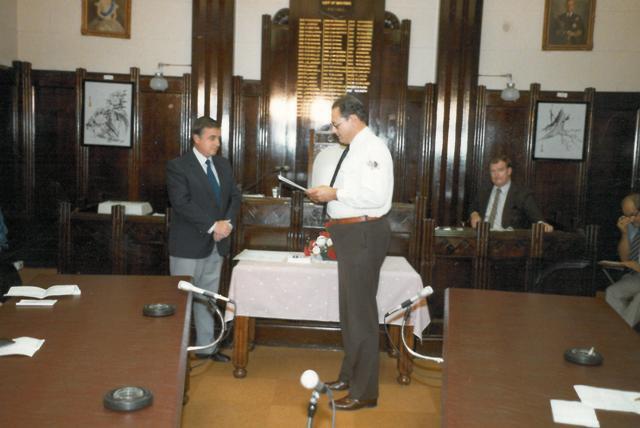 Councillor John Campbell reciting the Oath of Office, Dalby Town Council, circa 1982