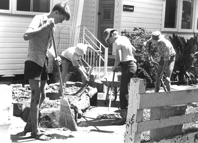 Cleaning up the aftermath of the floods in Dalby, 1981
