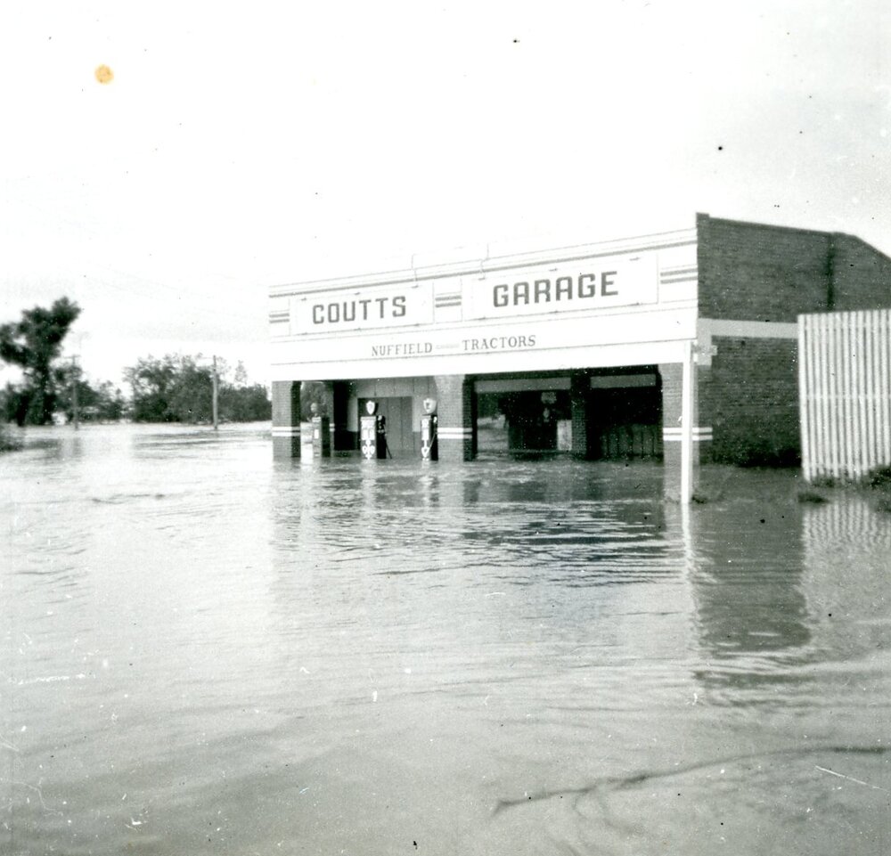 Flooding at Coutts Garage, Dalby, 1956