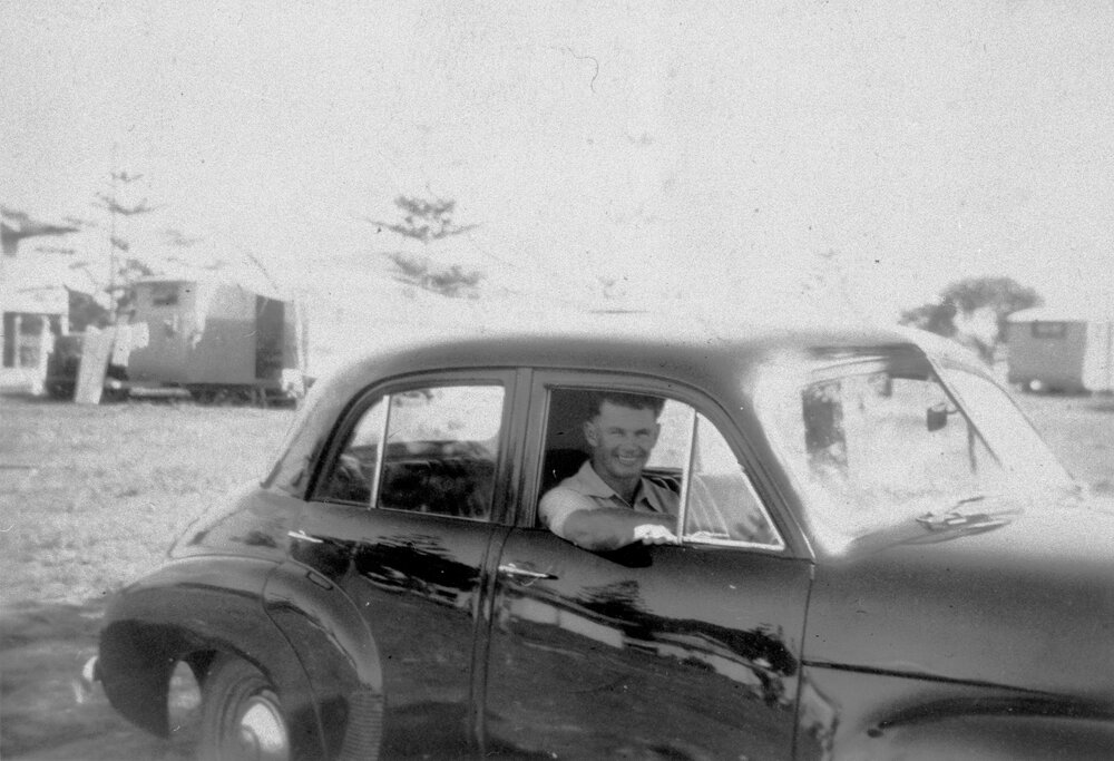 Man in a car, no location, no date