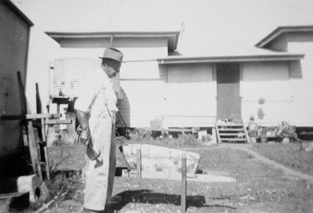 Man with a wheelbarrow, no location, no date