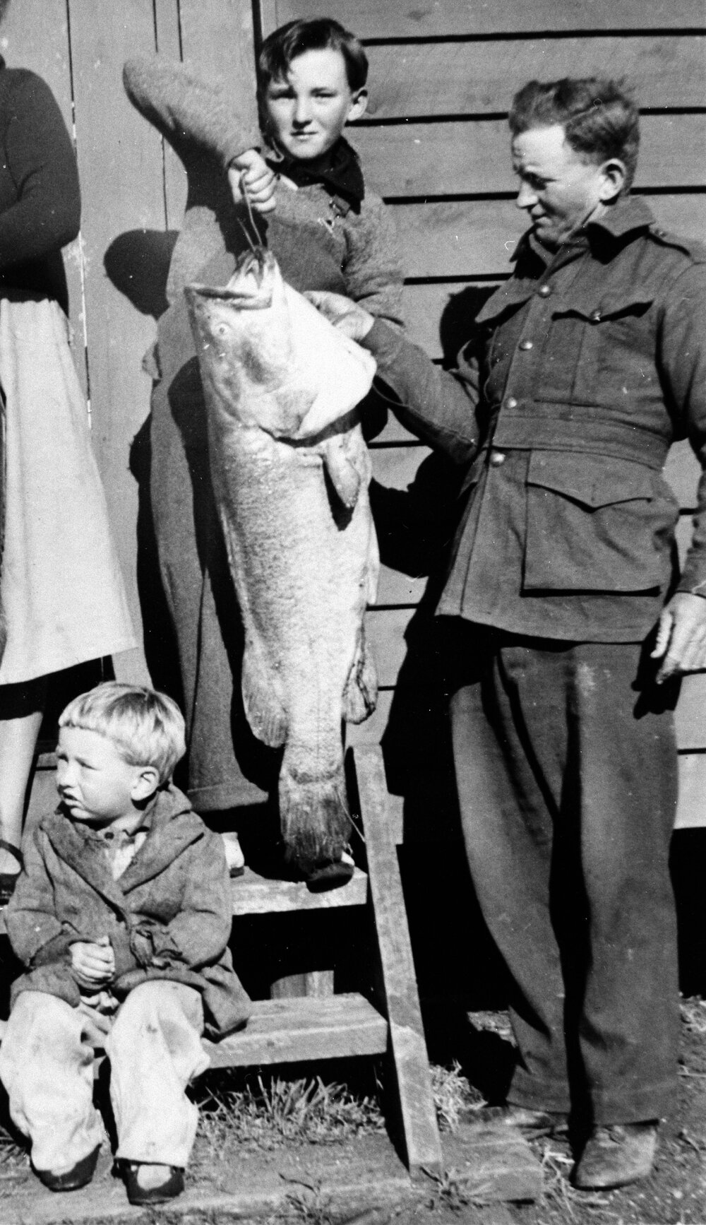 Group with a fish, no location, no date