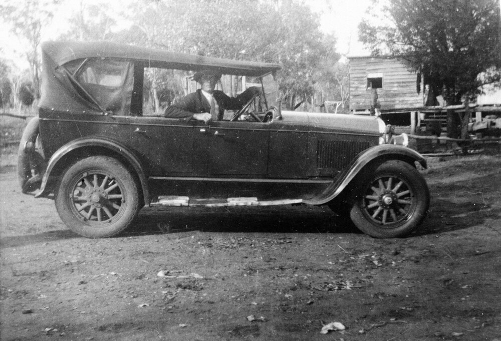 Man in a car, no location, no date
