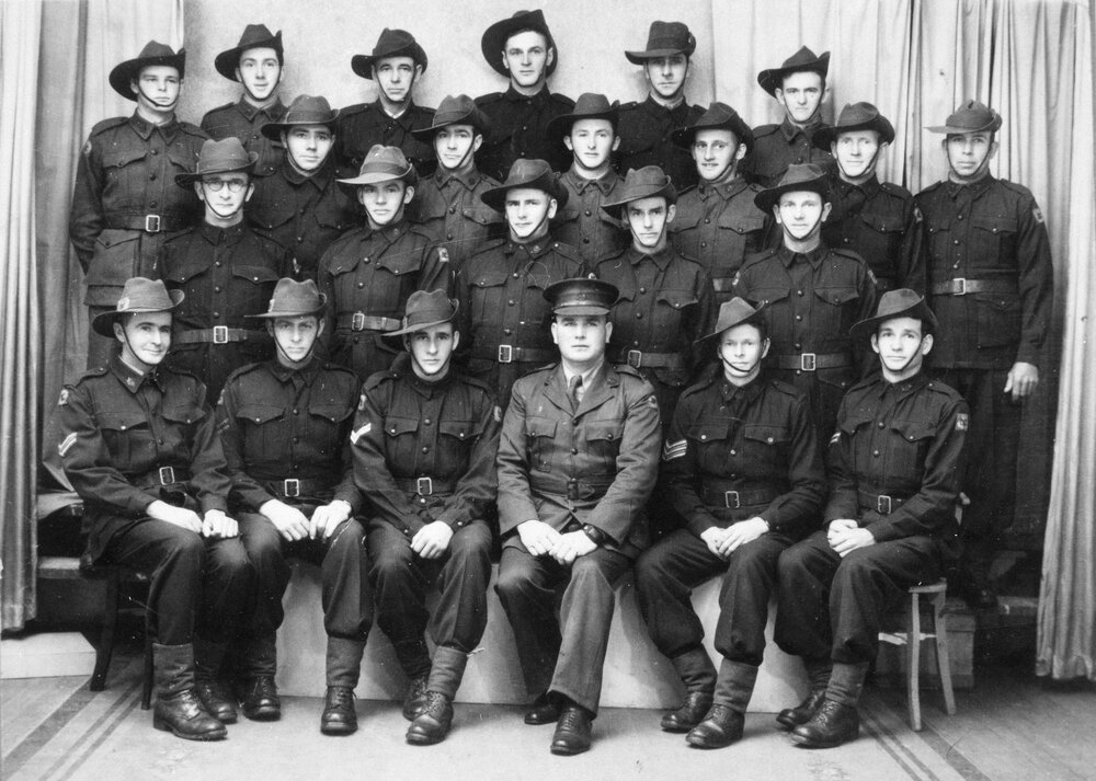 Group of men in uniform, no location, no date