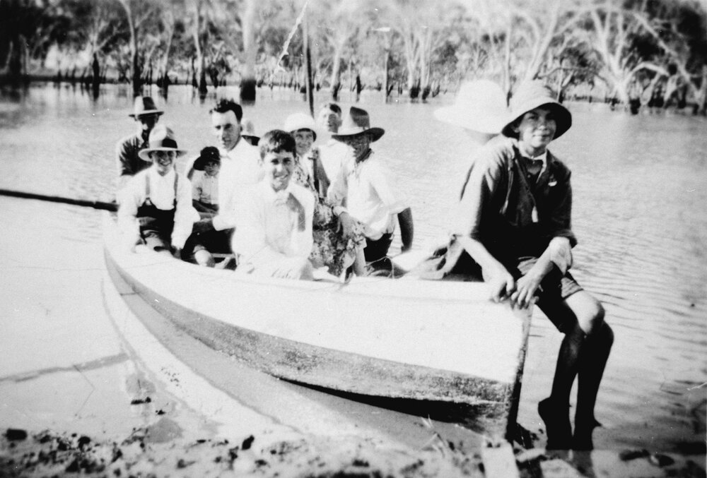 Group in a boat, no location, no date