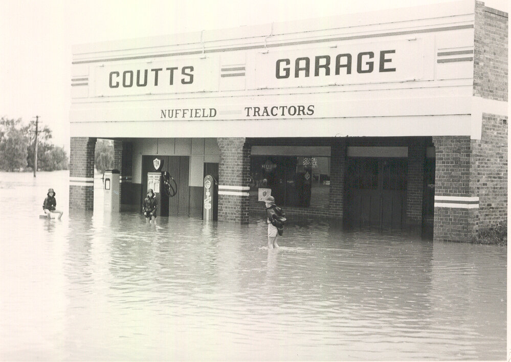 Flooding at Coutts Garage, Dalby, 1954