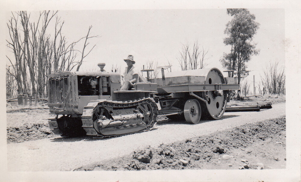 Crawler pulling a roller &amp; screed on Downfall Creek Road, Guluguba, 1939
