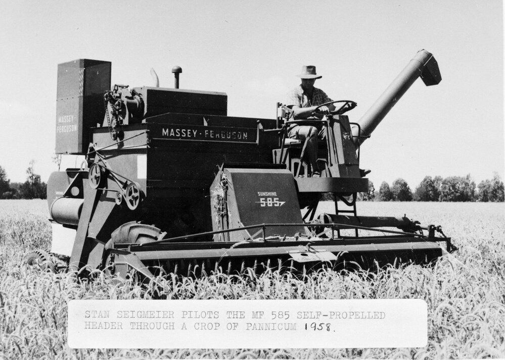 Stanley Seigmeier driving a MF 585 self-propelled header, Warra, 1958