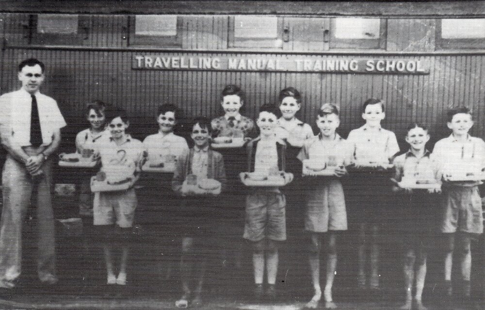 A group of students outside the Travelling Manual Training School, Jandowae, 1927