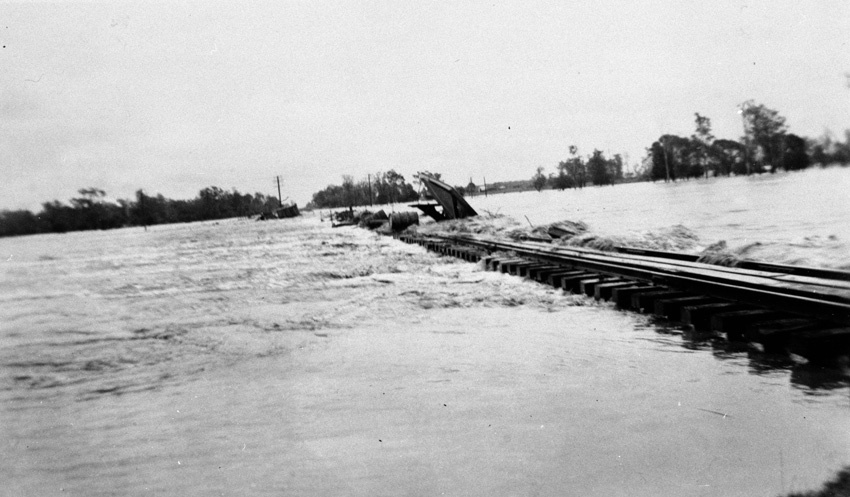 Flooding at a railway bridge, Warra, 1942