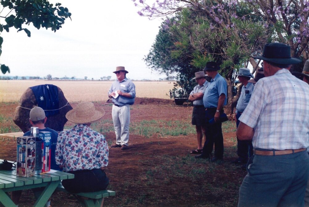 Past students gathered around the rock, Pleasant Park State School, 1999