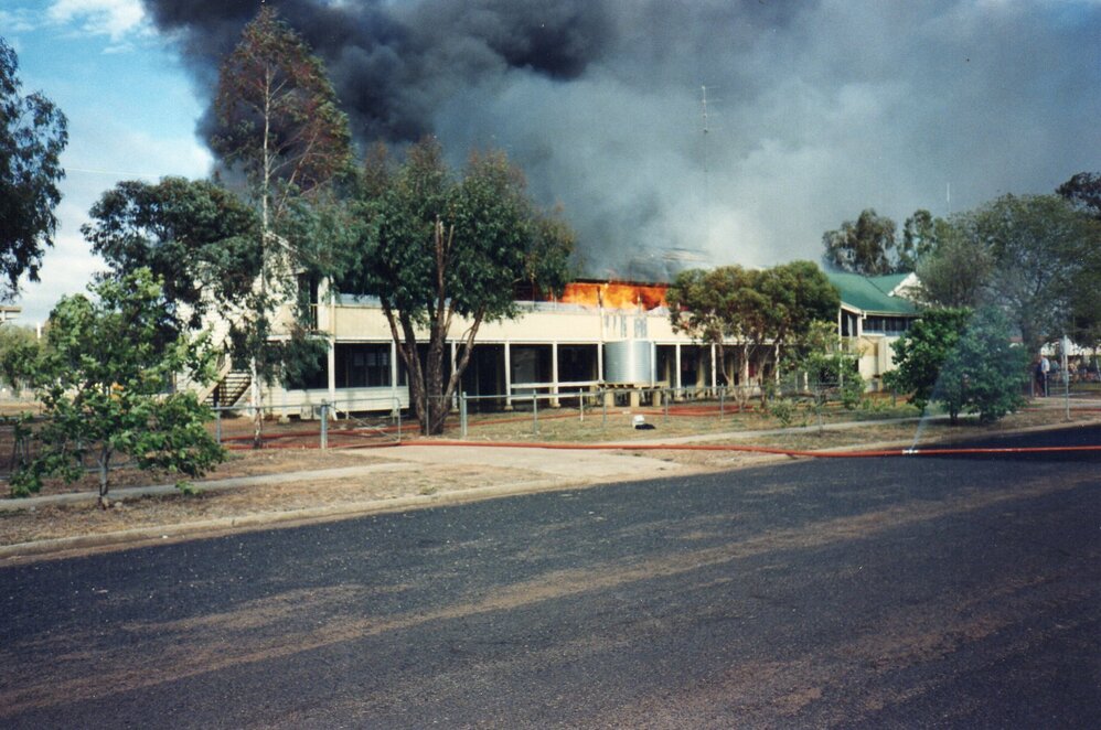 Main classroom block on fire, Meandarra State School, 1995