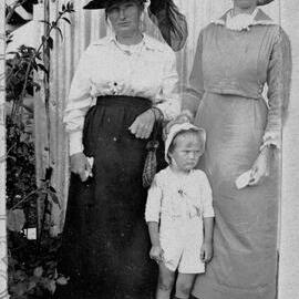 Two ladies & a child, no location, no date