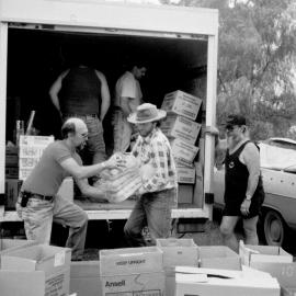 Unloading supplies, no location, no date