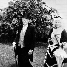 Couple in fancy dress, no location, no date