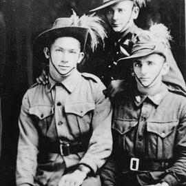 Three men in uniform, no location, no date
