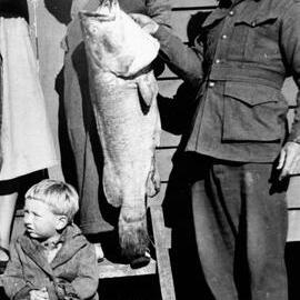 Group with a fish, no location, no date