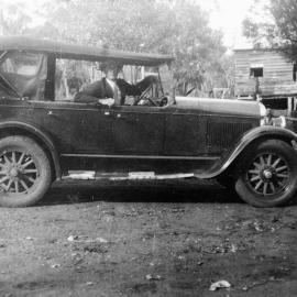 Man in a car, no location, no date