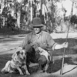 Man with a dog, no location, no date