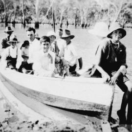 Group in a boat, no location, no date