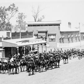 Jandowae Troop of the 11th Light Horse Regiment parading down George Street, Jandowae, 1929