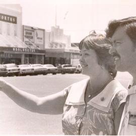 Unknown people standing on Cunningham Street, Dalby, 1983