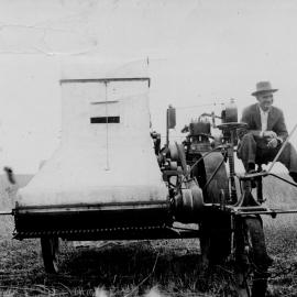 Mr. B. Zerbst on a harvester, Chinchilla, 1915